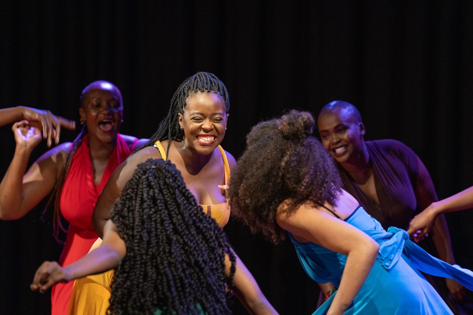 Close stage image of the Silenced No More ensemble in performance